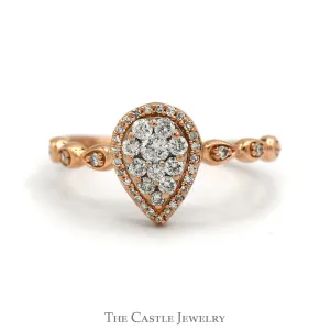 Pear Shaped Diamond Halo Cluster Ring With .25 CTTW Round Diamonds In 10KT Rose Gold