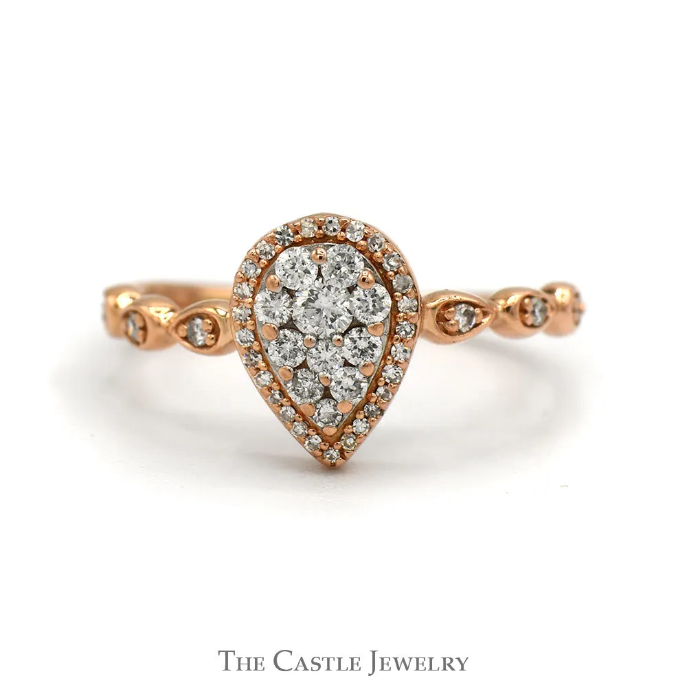 Pear Shaped Diamond Halo Cluster Ring With .25 CTTW Round Diamonds In 10KT Rose Gold
