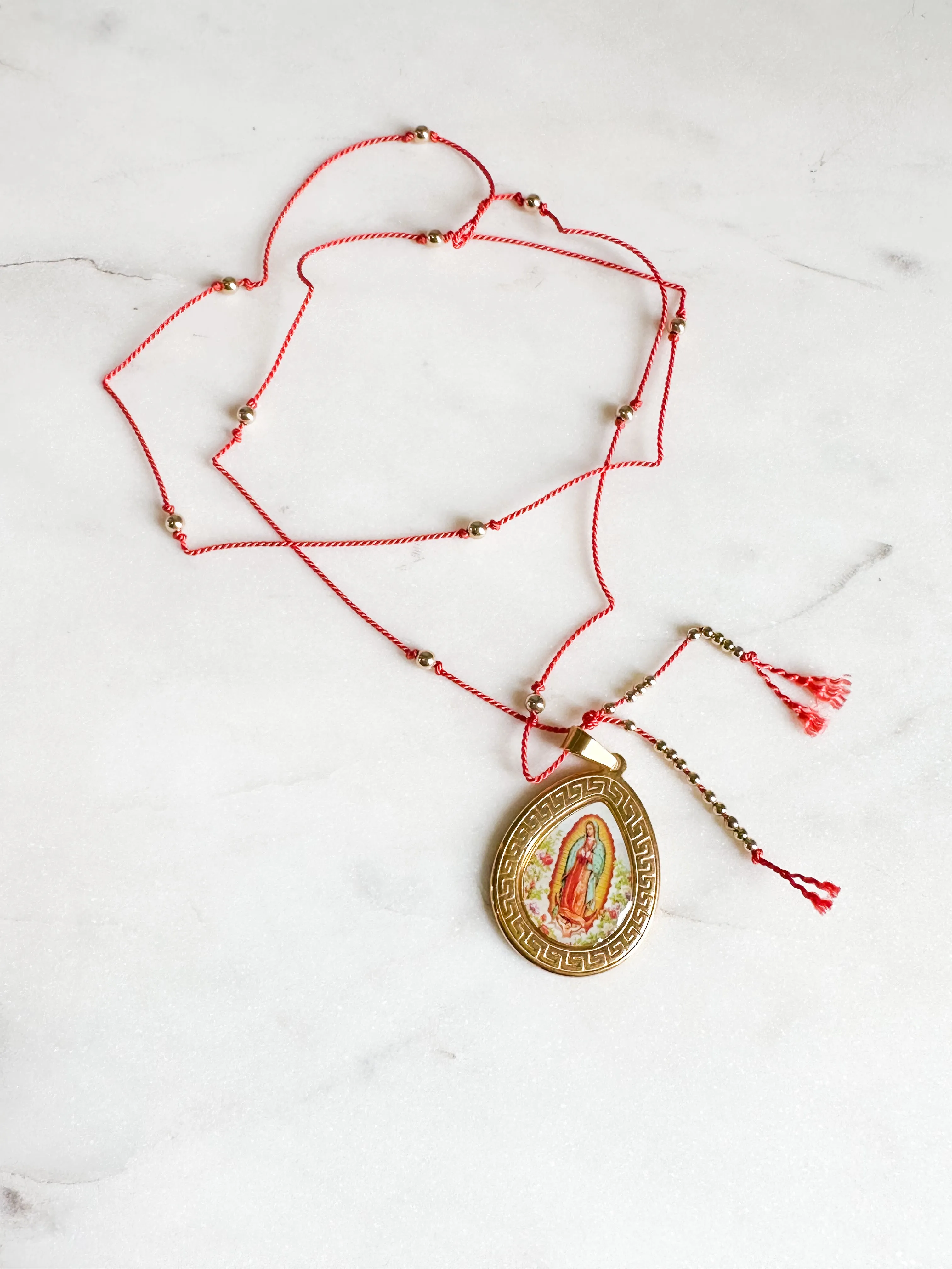 Virgin Mary on Silk Necklace